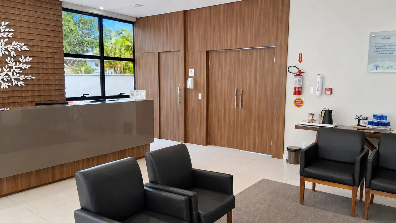 Recepção da Nova Belluno, com atendimento e área de espera